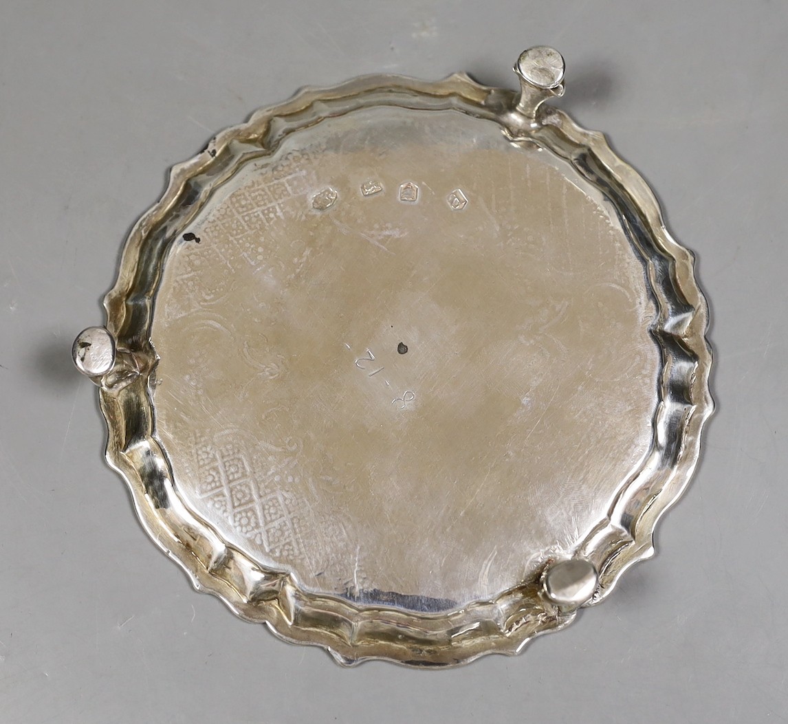 A George II silver waiter, with later? engraved decoration, indistinct maker's mark, London, 1736, 15.3cm, 7.5oz.